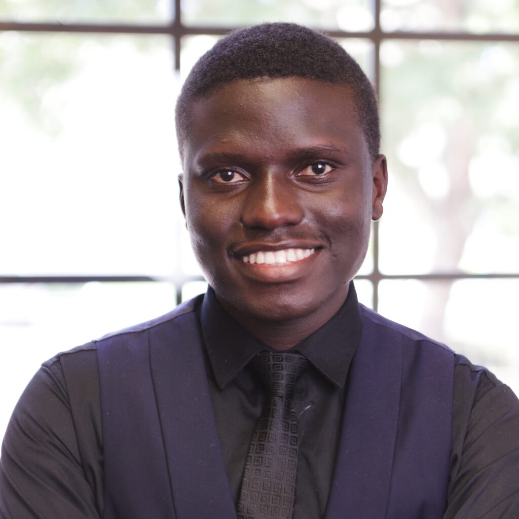 Headshot of Genesis Mwamba 